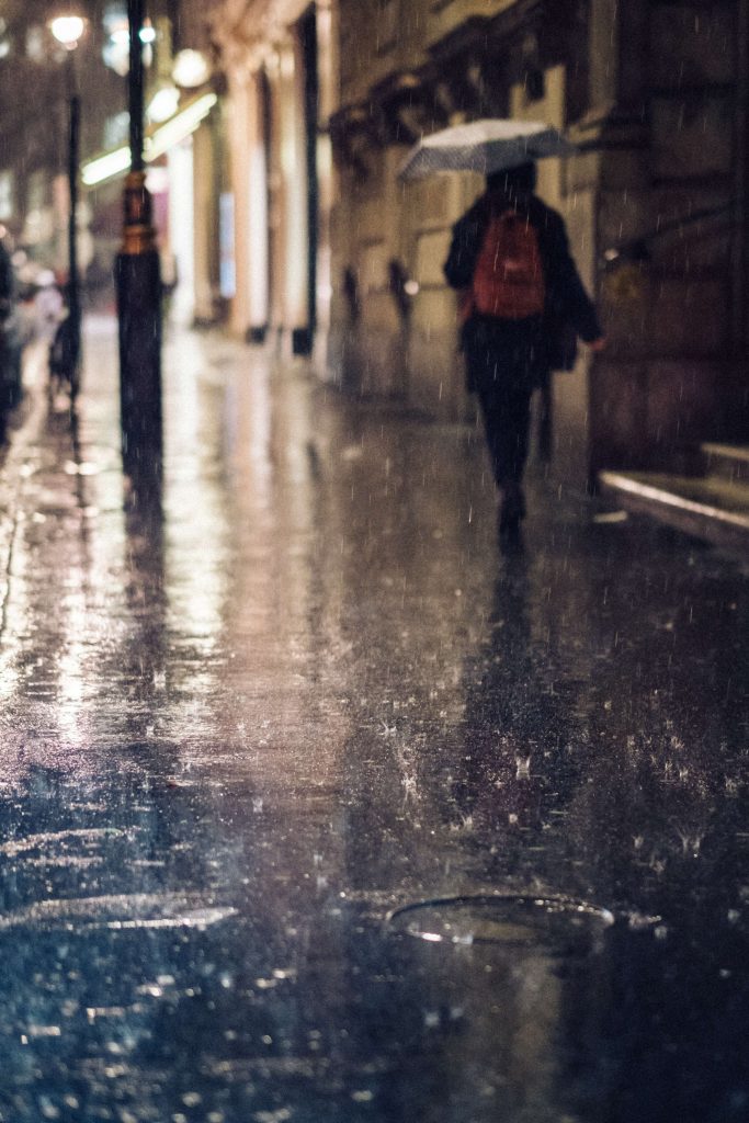 Artist Paints Of People Walking In The Rain
